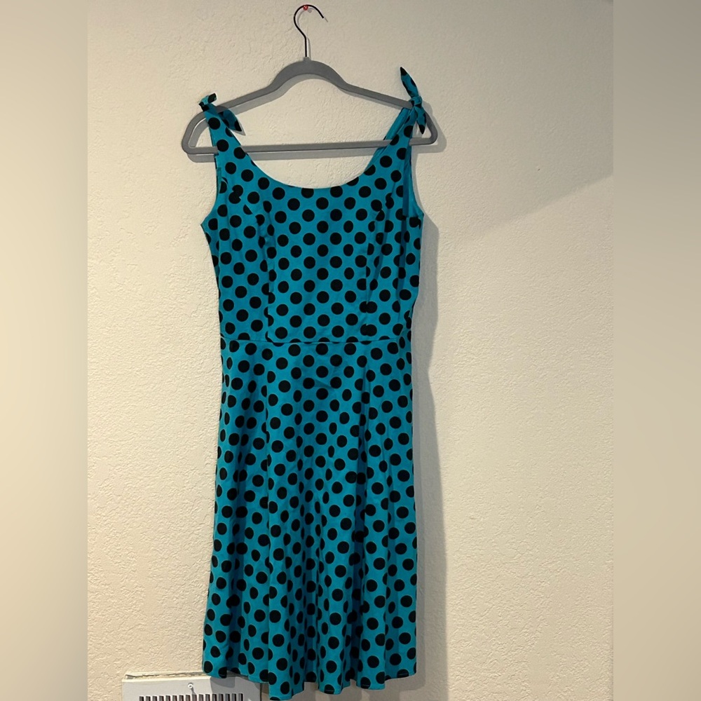 Rocker billy style blue & black polka dot dress, fit like a size 6/7 though.